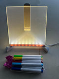 3D LED writing pad with a sleek design and colorful markers for creative drawings and messages