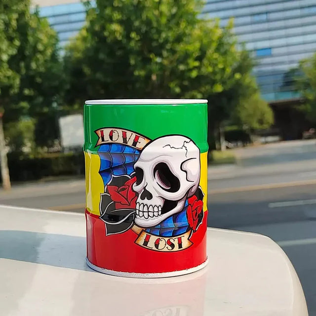 Colorful barrel drum ashtray with a skull design, roses, and the text Love Lost