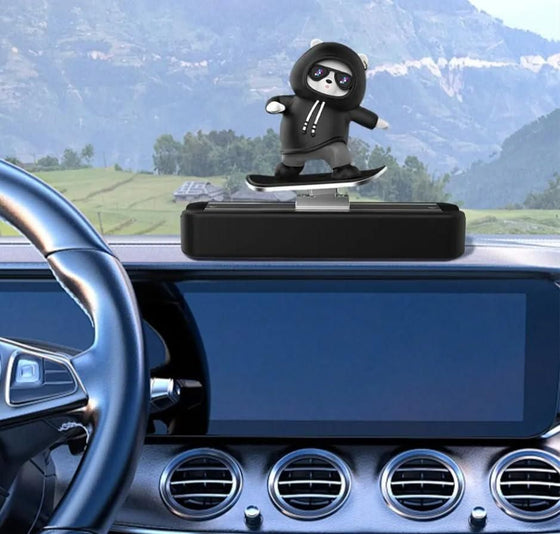 Unique car dashboard decoration featuring a skateboard-riding figure on a sleek base