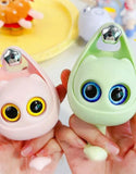 Adorable Dropdash cute key hooks for walls in pink and green, featuring large expressive eyes