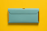 Elegant pink studded clutch featuring a sleek design perfect for evening outings