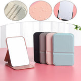 Foldable makeup mirror set in various colors, ideal for travel and easy storage
