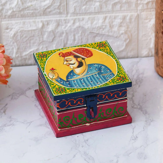 Handcrafted wooden jewellery box with vibrant traditional painting and intricate design