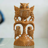 Handcrafted wooden owl decor featuring a detailed design with multiple owls on a tree