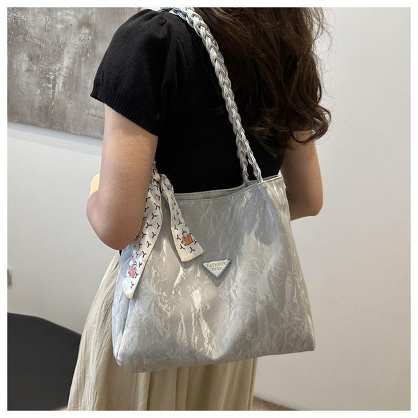 Imported double-shaded tote bag in silver with braided straps and stylish design for everyday use