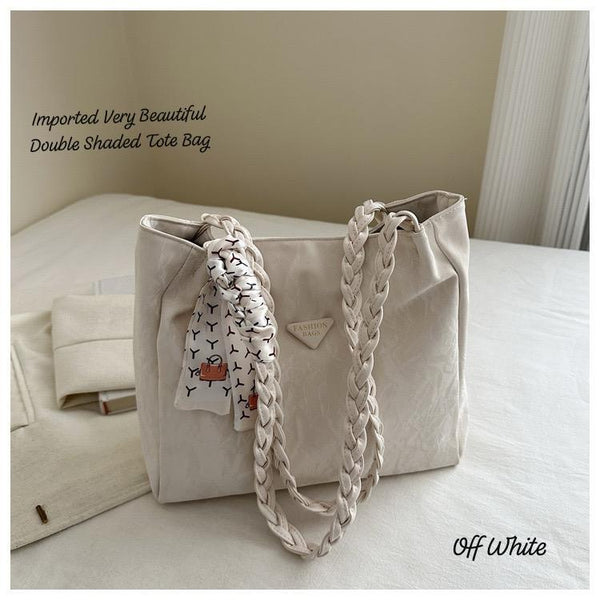 Imported double-shaded tote bag in off white with braided straps and stylish details
