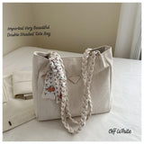 Imported double-shaded tote bag in off white with braided straps and stylish details