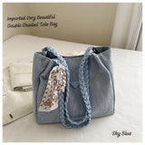 Imported double-shaded tote bag in sky blue with braided handles and a decorative scarf