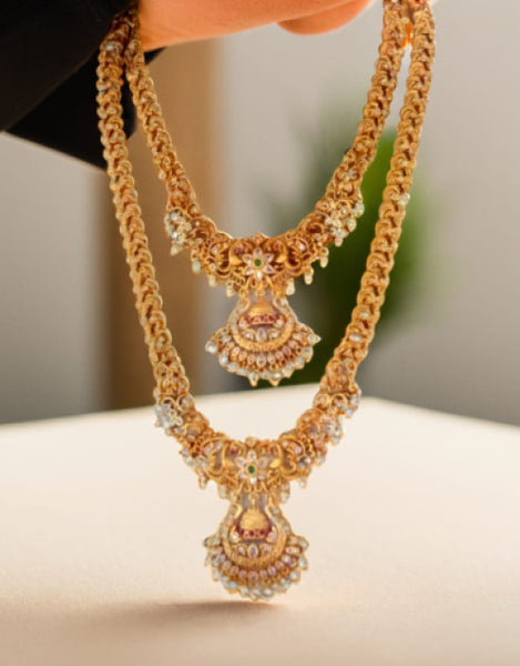 Dropdash Indian bridal jewelry set with intricate design and shimmering details perfect for weddings