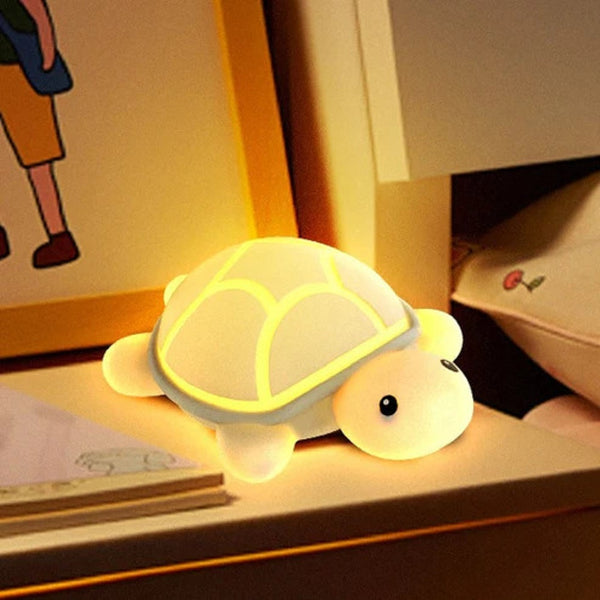 LED turtle night light glowing softly on a bedside table, perfect for children's rooms