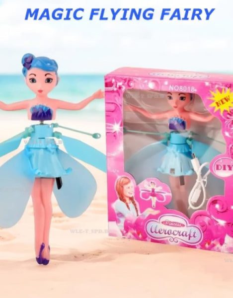 Magic flying fairy doll with blue hair in a colorful box for kids to enjoy and play