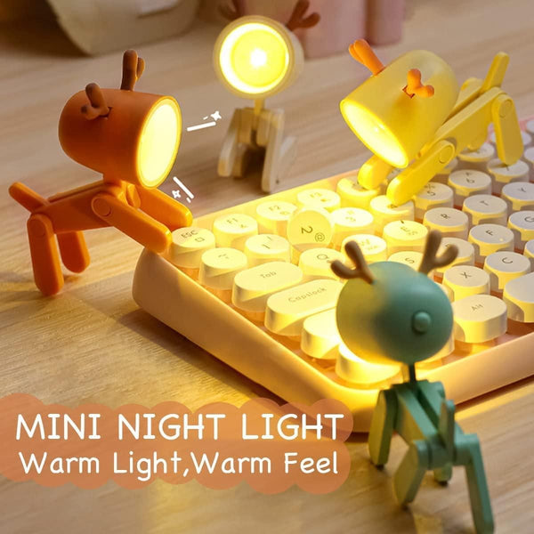 Colorful mini LED desk lamp in playful designs providing soft warm light for a cozy workspace
