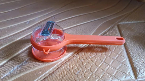 Orange peeler with storage for easy fruit and vegetable peeling and mess-free storage