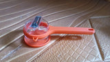 Orange peeler with storage for easy fruit and vegetable peeling and mess-free storage
