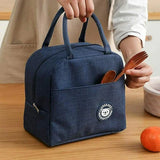 Stylish portable lunch bag with pocket for easy storage and carrying meals on the go