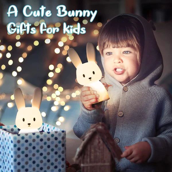 Kid holding a rechargeable bunny night lamp with a cute design, perfect for gifts for kids
