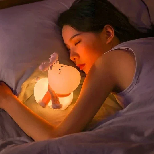 Adorable reindeer touch lamp for kids providing soft glow, perfect for bedtime comfort and relaxation