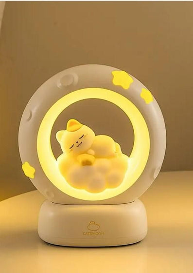 Sleeping Cat LED Night Light in a circular design with soft yellow glow for a cozy bedroom ambiance