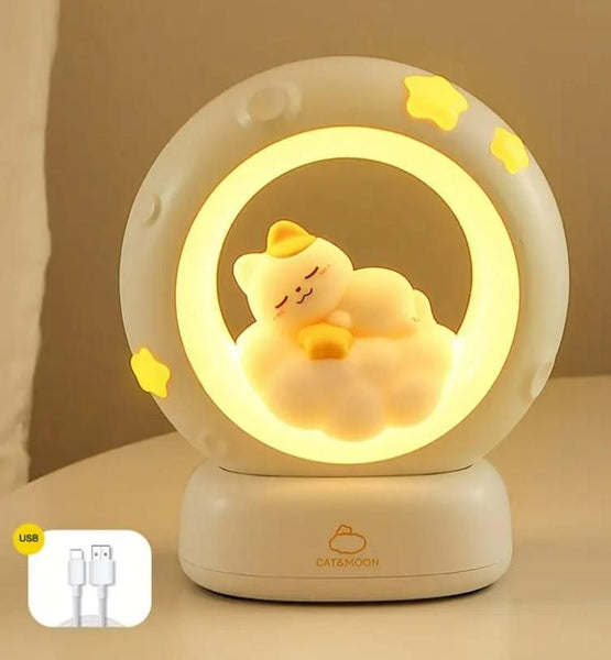 Sleeping Cat LED Night Light in a circular design with soft glow and USB charging feature