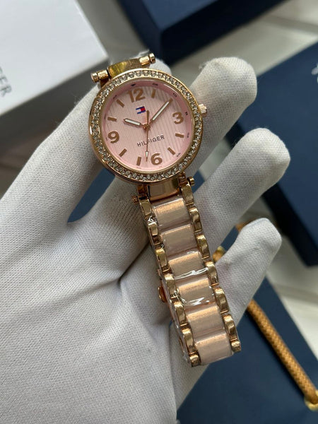 Stylish women's watch with a rose gold bracelet and sparkling bezel, perfect for any occasion
