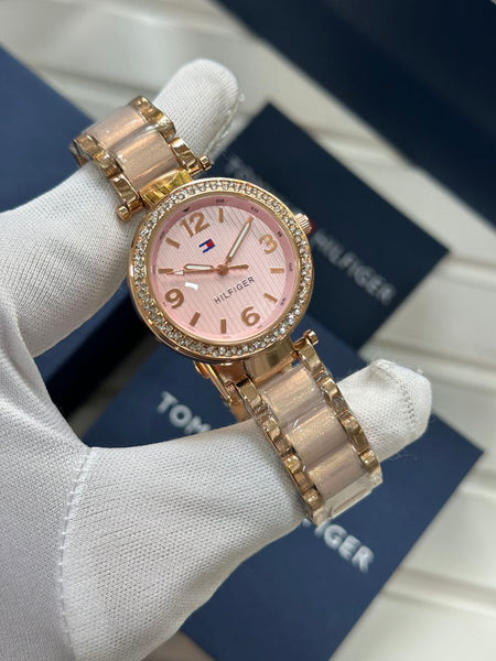 Tommy Hilfiger stylish women's watch with a pink dial and rose gold bracelet, perfect for everyday wear