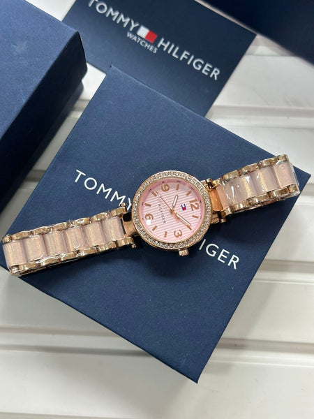Tommy Hilfiger stylish women's watch with pink dial and embellished strap in a blue box