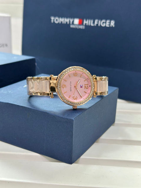 Tommy Hilfiger stylish women's watch with a pink dial and elegant gold-tone details