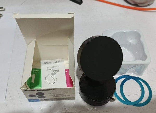 vnj54e-mk black round shower filter cartridge with installation instructions and blue rubber gaskets
