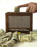 Dropdash wooden money piggy bank with a savings chart and cash notes for money management