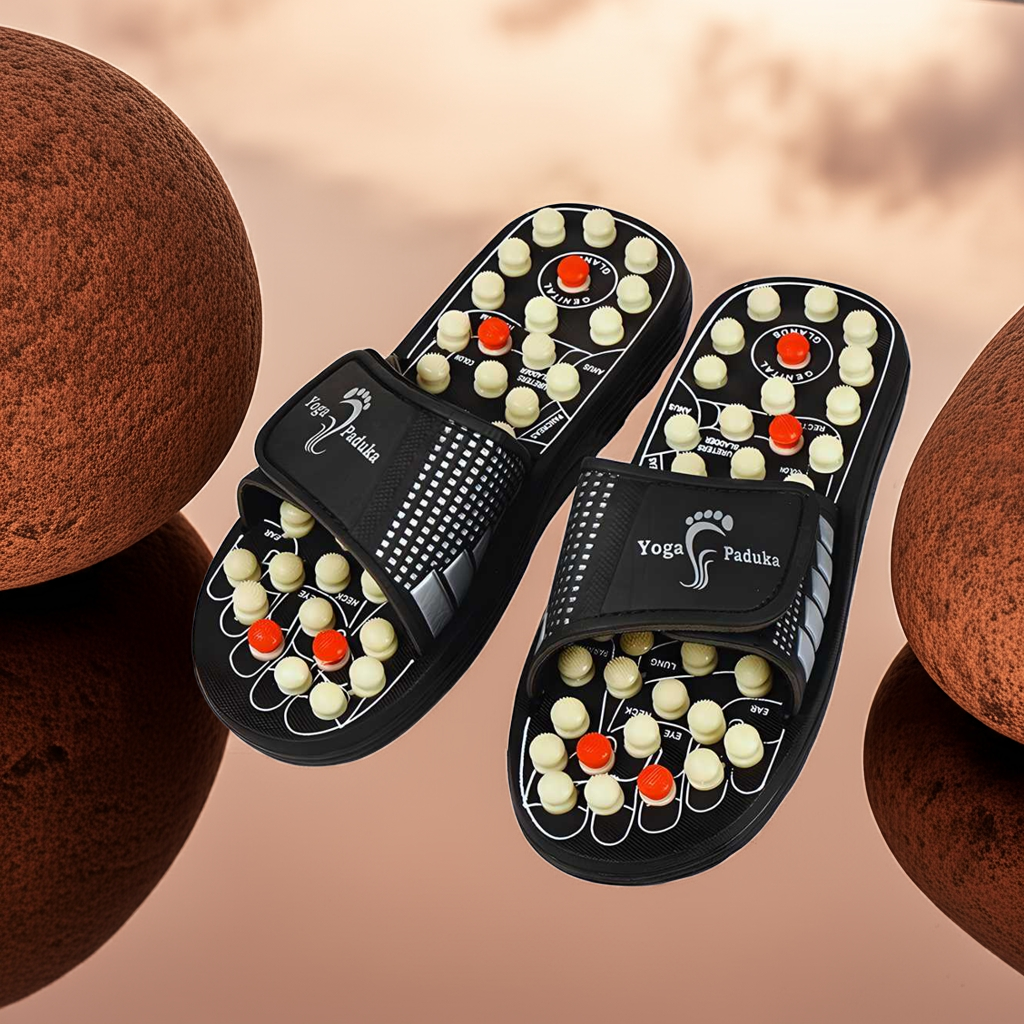 Black Yoga Paduka acupressure therapy slippers with white and red massage nodes for foot relief